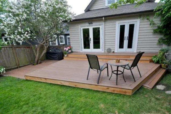 stylish wooden outdoor deck without railing