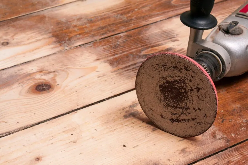 wooden deck floor with resurfacing tools